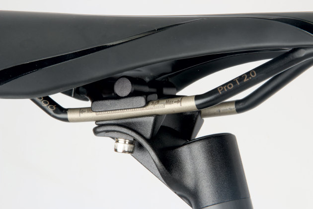 Offset seatpost mount affords a steeper seat tube angle.